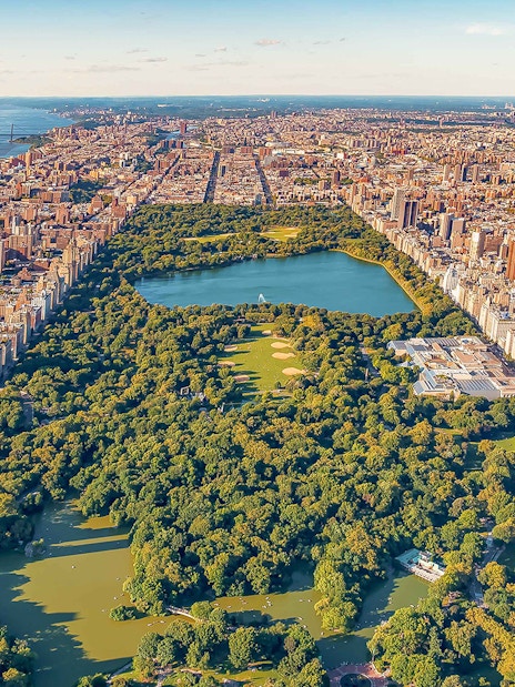 Aerial view of Central Park and Manhattan skyline during NYC helicopter tour.