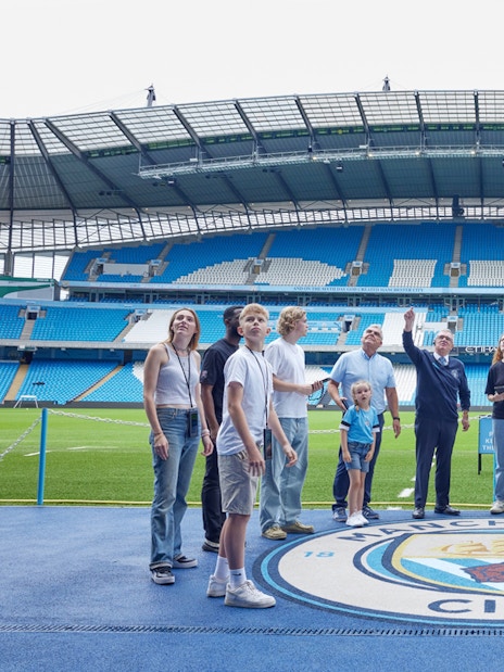 Visitors on a guided tour at Etihad Stadium, home of Manchester City FC.