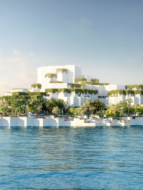 Aerial view of National History Museum Abu Dhabi with modern architecture and waterfront.