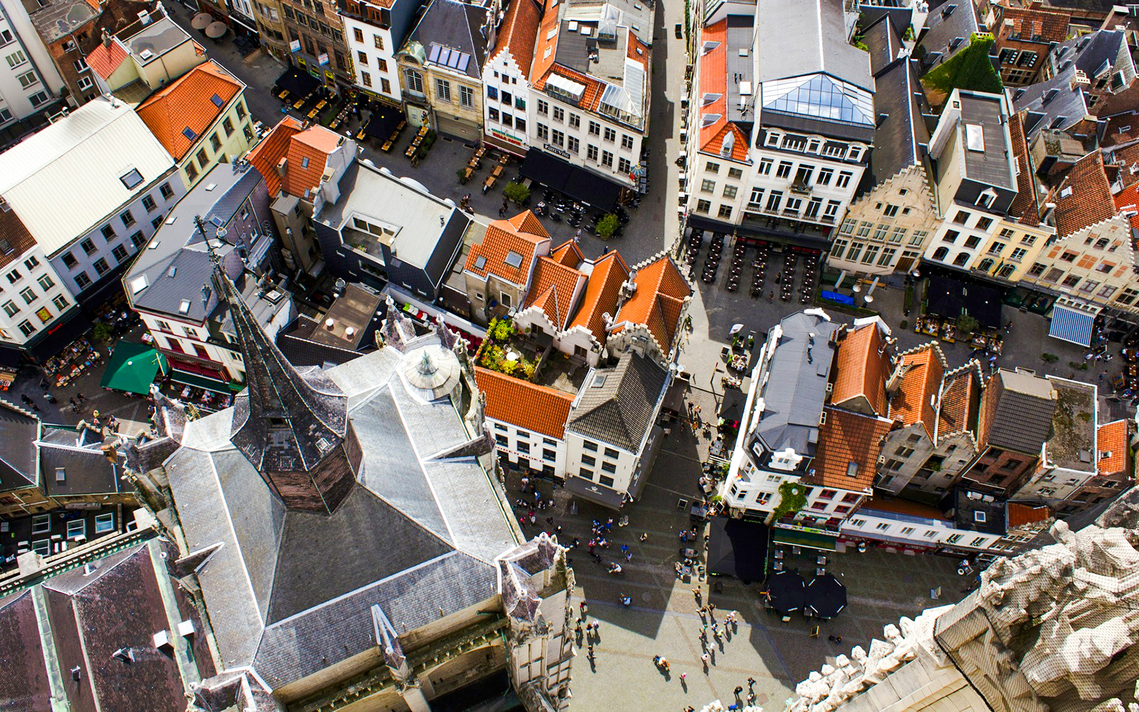 High-angle view of Antwerp's historic city center with Cathedral of Our Lady and surrounding streets.