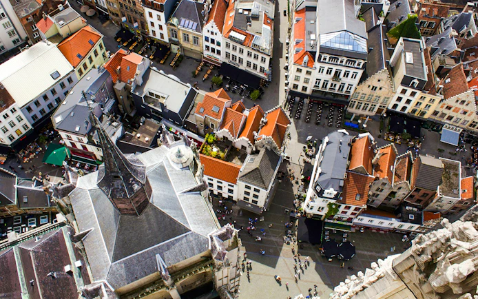 High-angle view of Antwerp's historic city center with Cathedral of Our Lady and surrounding streets.