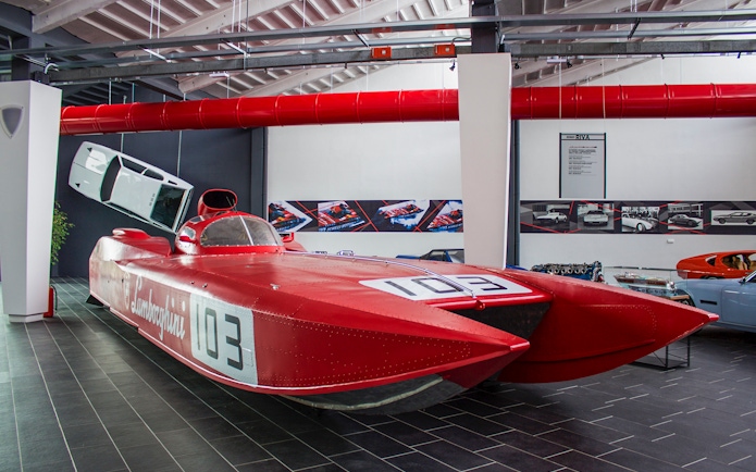 Red Lamborghini speedboat exhibit at Ferruccio Lamborghini Museum, Bologna, Italy.