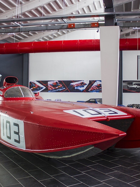 Red Lamborghini speedboat exhibit at Ferruccio Lamborghini Museum, Bologna, Italy.