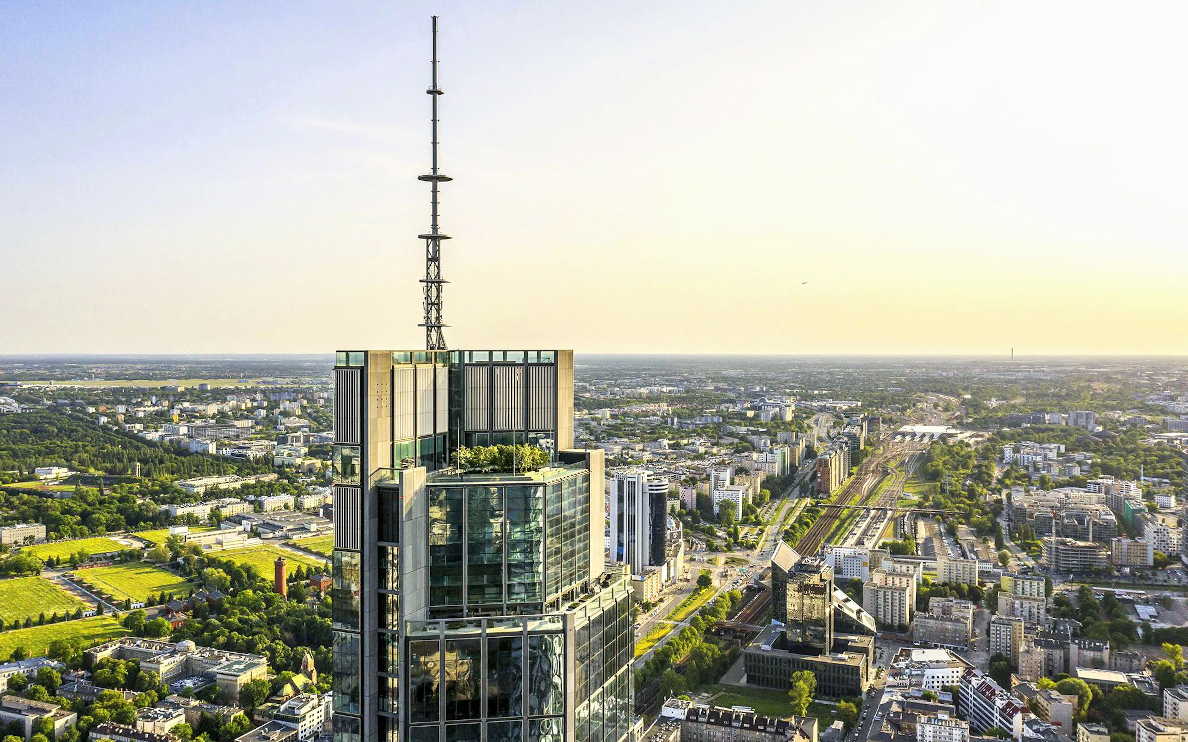 Aerial view of Warsaw skyline with Highline building in foreground.