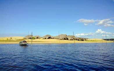 Speedboat on Preguiças River near Caburé huts, Sao Paulo tour.