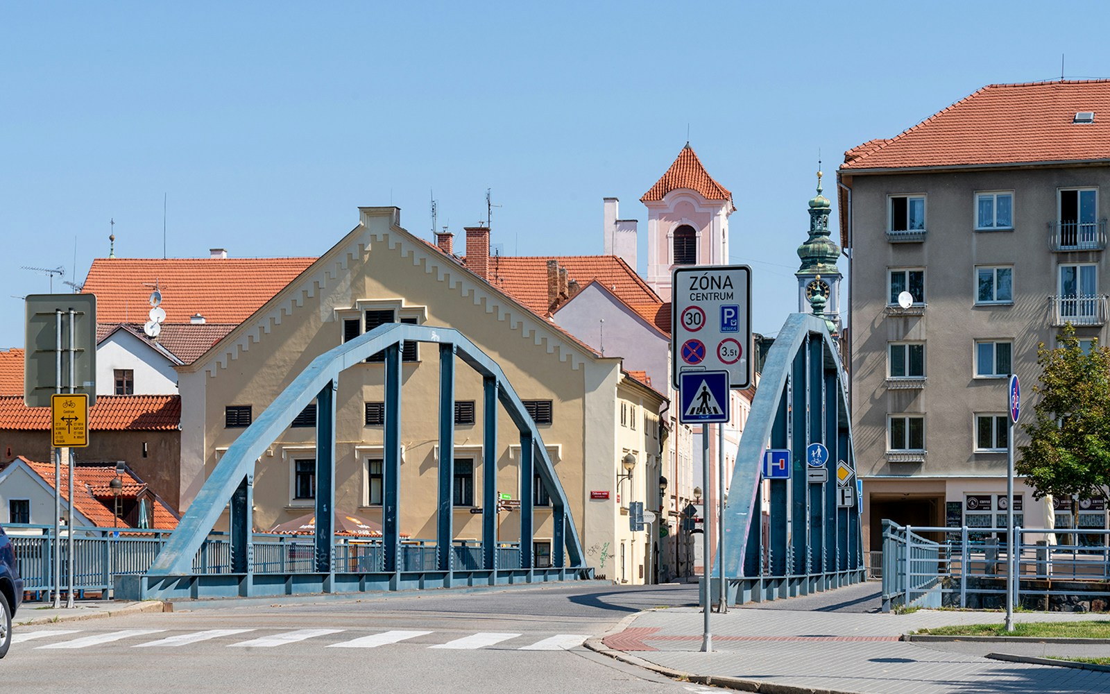 Street view with bridge and historic buildings in Ceske Budejovice, Czech Republic.