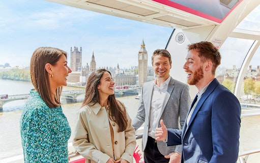 Group enjoying the view of Big Ben from a London Eye capsule.