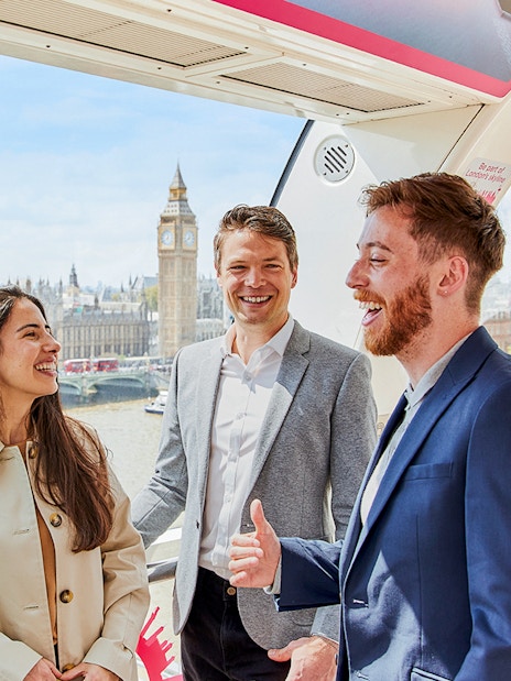 Group enjoying the view of Big Ben from a London Eye capsule.