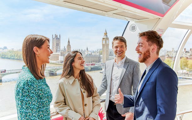 Group enjoying the view of Big Ben from a London Eye capsule.