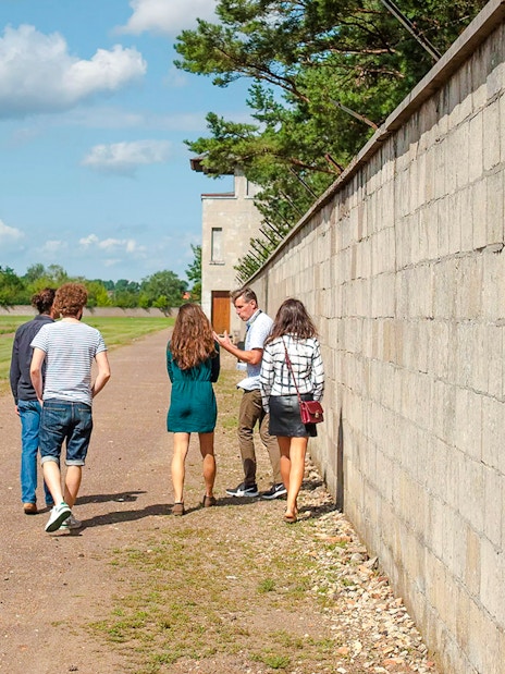 Guests touring Sachsenhausen Concentration Camp Memorial with a guide.