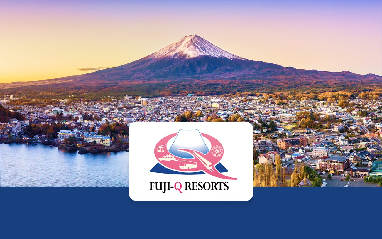 Mt. Fuji overlooking a cityscape near Fuji-Q Resorts, Japan.