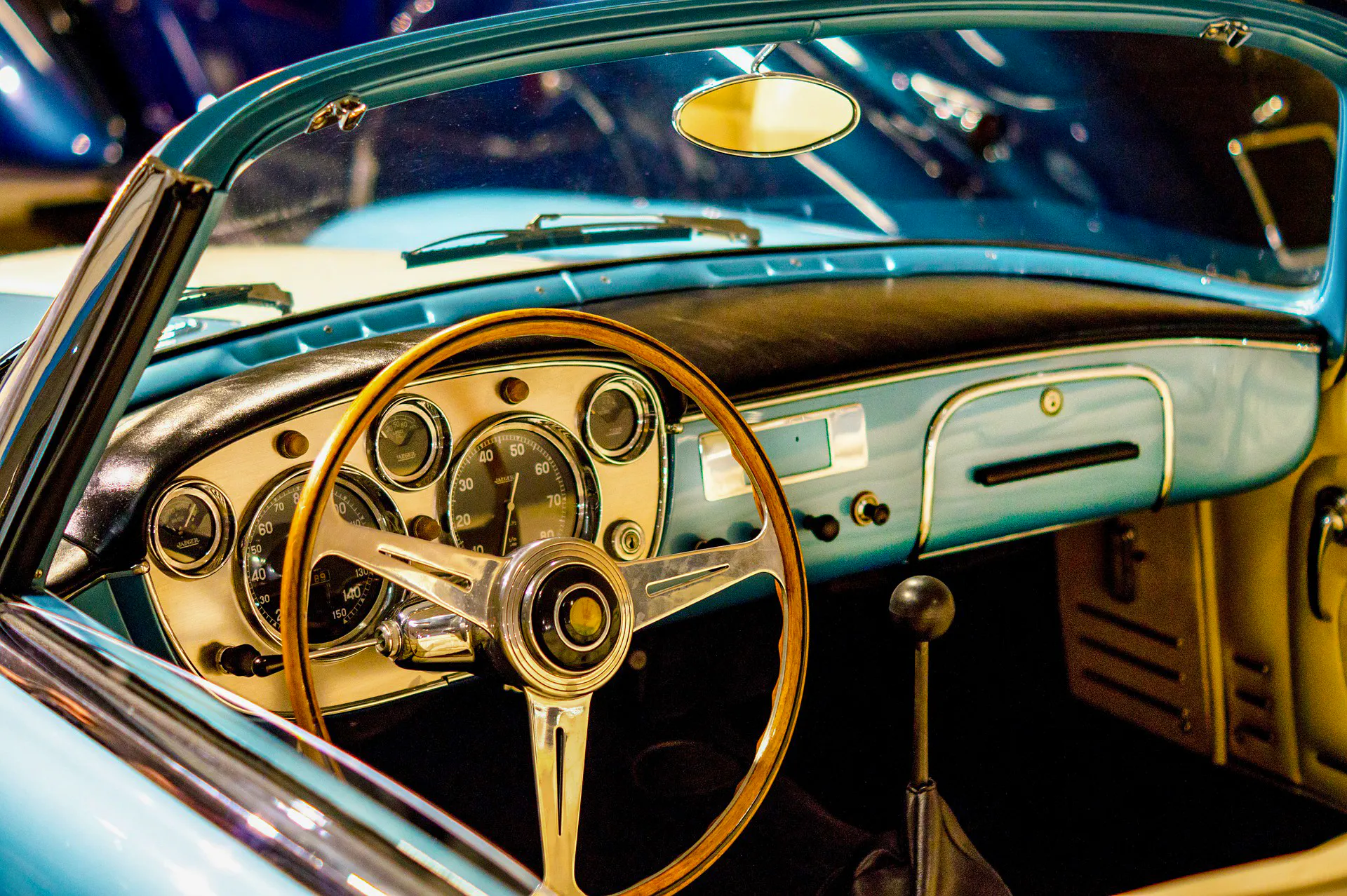 Vintage car dashboard with wooden steering wheel, part of The Sunrise Vintage Experience in Cappadocia.