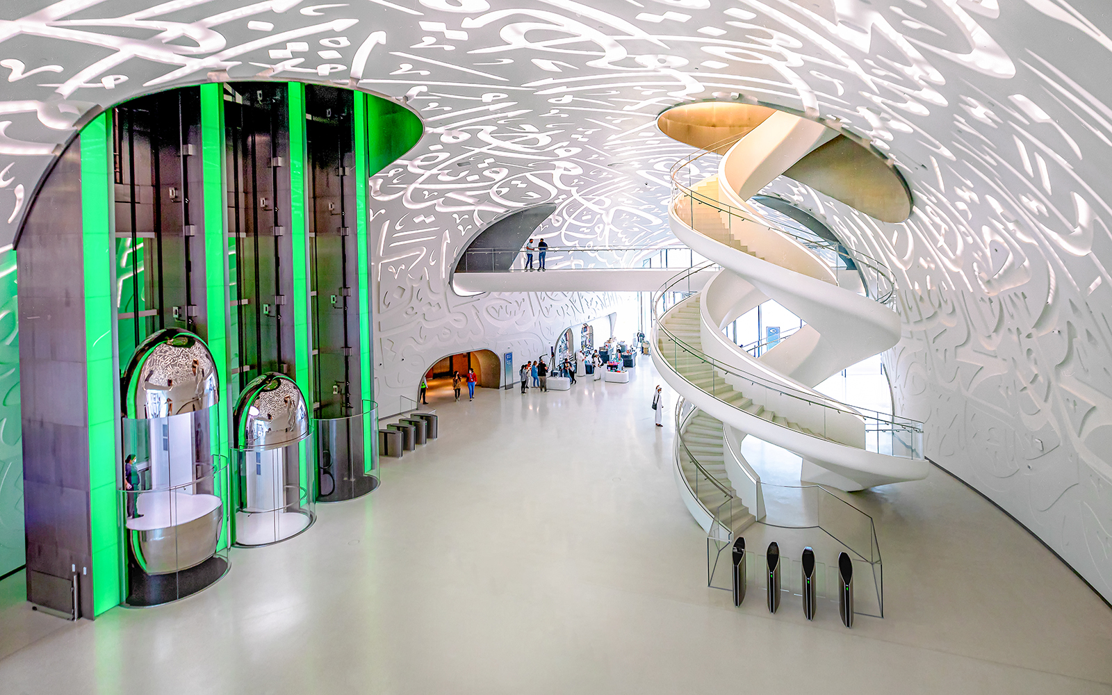 Futuristic interior of Museum of The Future with spiral staircase and elevators in Dubai.