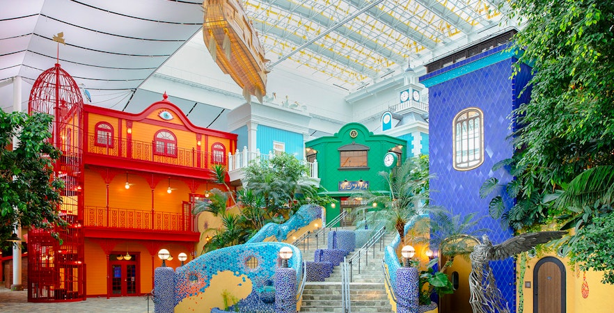 Colorful buildings and sculptures inside Ghibli Park's Grand Warehouse, Japan.