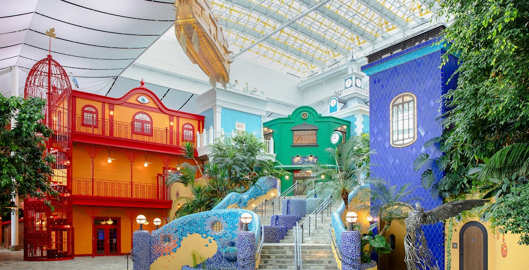 Colorful buildings and sculptures inside Ghibli Park's Grand Warehouse, Japan.