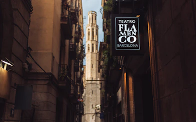 Teatro Flamenco Barcelona sign in a narrow street with historic architecture.