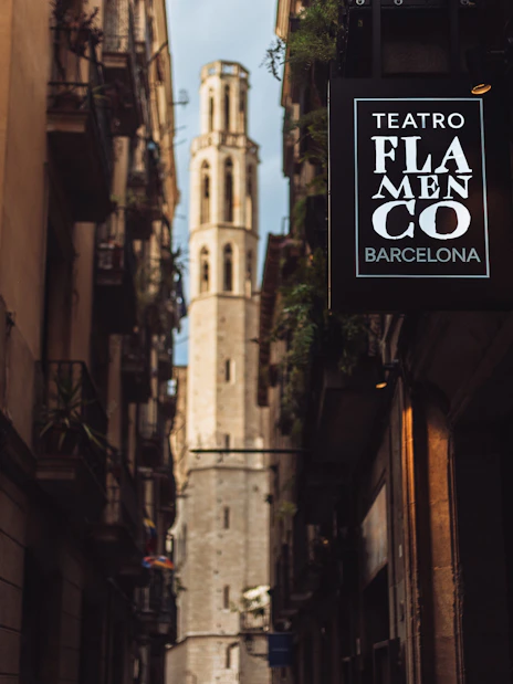 Teatro Flamenco Barcelona sign in a narrow street with historic architecture.