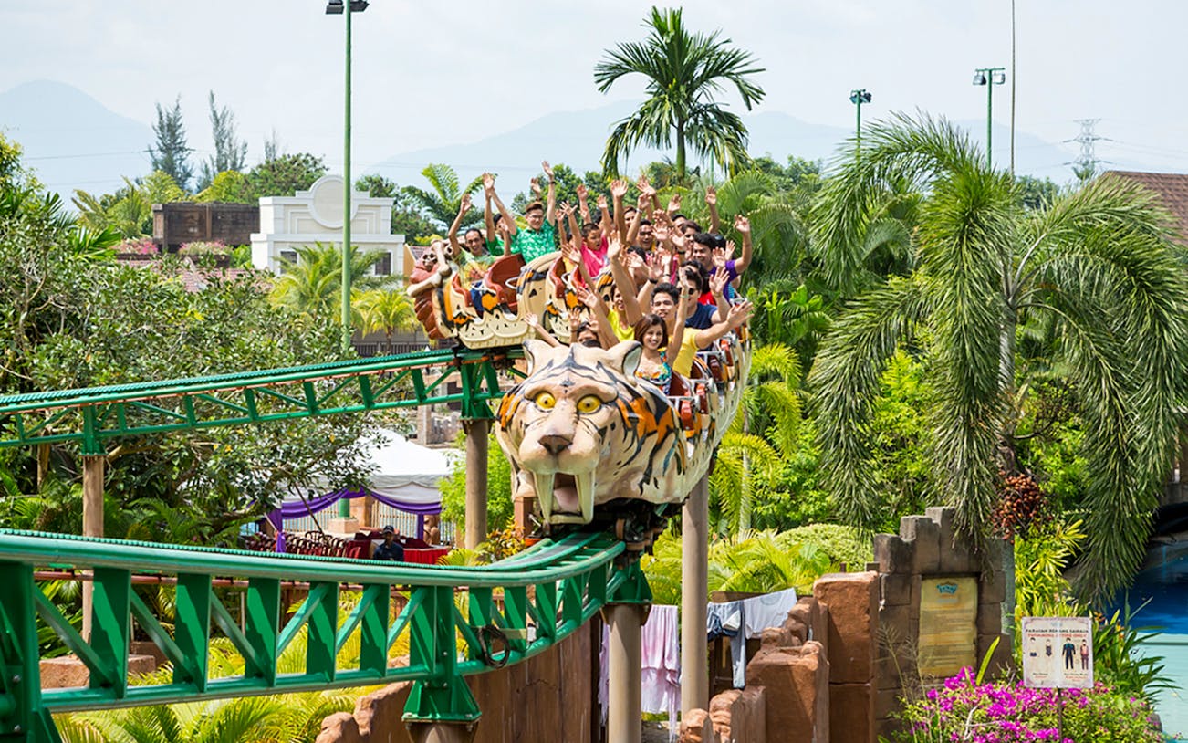 Roller coaster with tiger-themed cars at Sunway Lost World of Tambun, Malaysia.