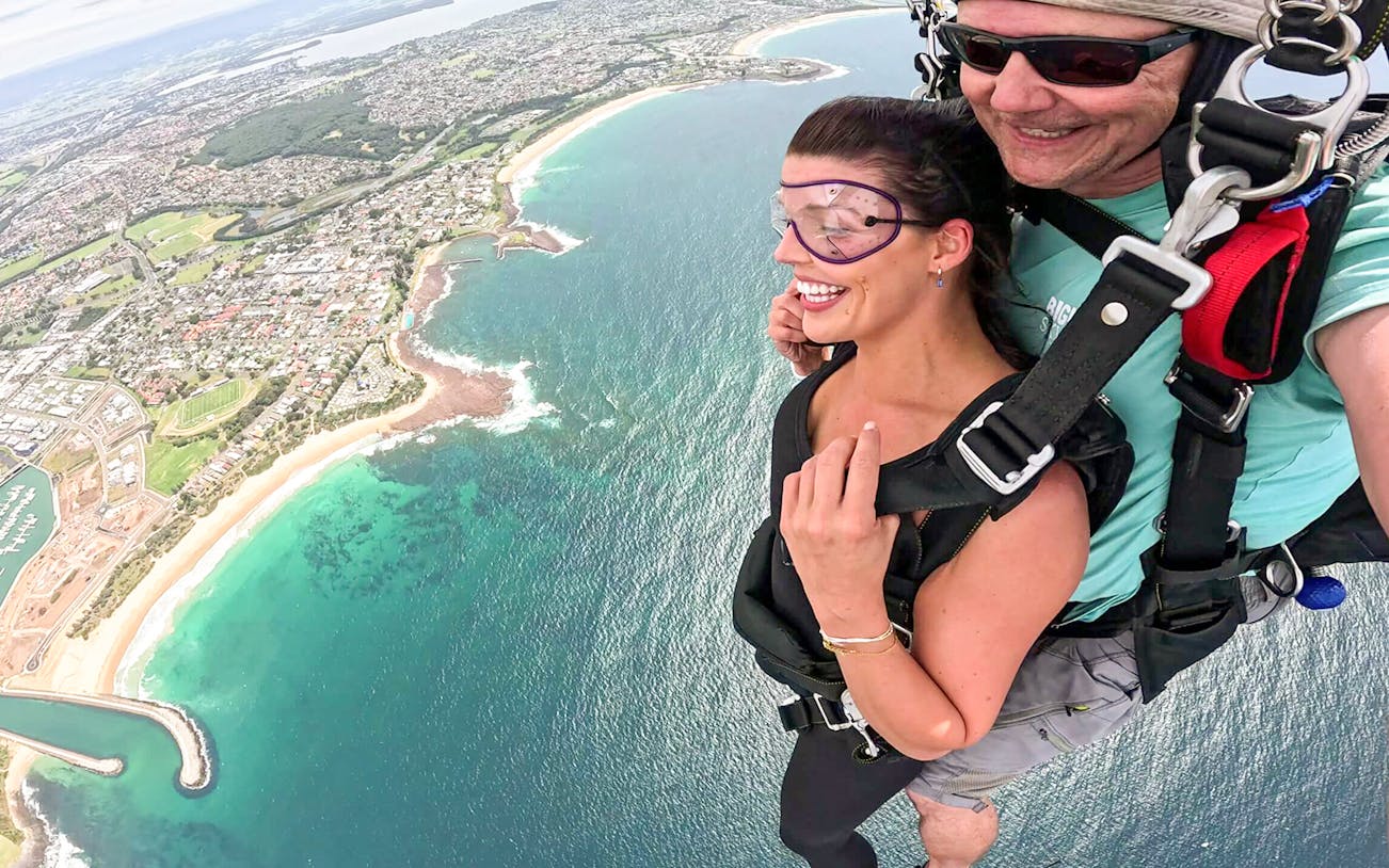 Tandem skydive over Shellharbour, Sydney, with coastal view from 15,000 feet.