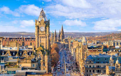Edinburgh cityscape featuring the Balmoral Hotel clock tower and Princes Street.