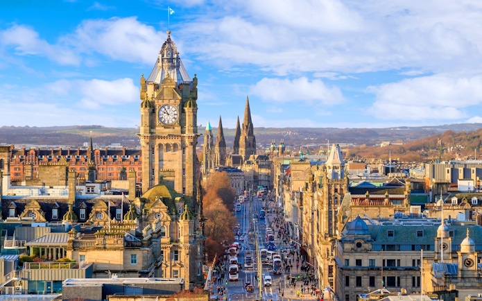 Edinburgh cityscape featuring the Balmoral Hotel clock tower and Princes Street.