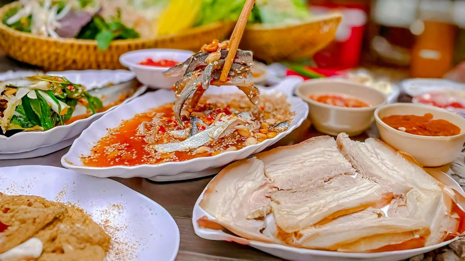 Local sashimi with sesame and peanuts in Da Nang, Vietnam.