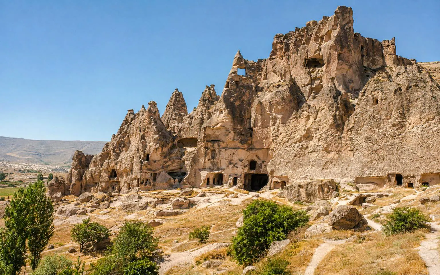 Uçhisar Castle rock formations in Goreme Valley, Cappadocia.