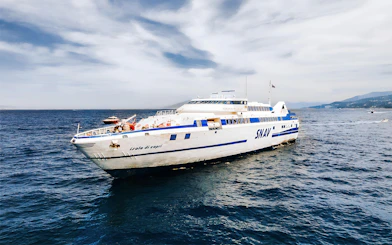 SNAV ferry sailing between Naples and Capri on a clear day.