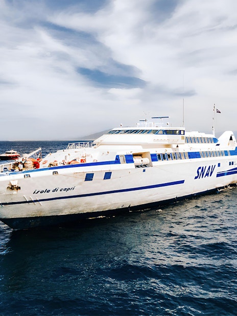 SNAV ferry sailing between Naples and Capri on a clear day.