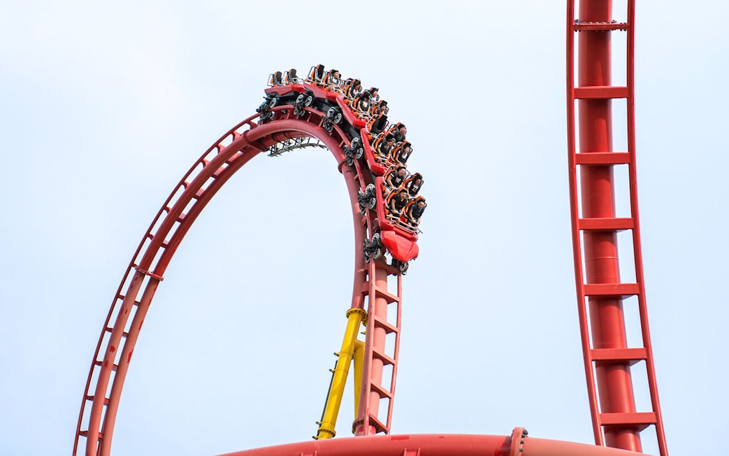 Rollercoaster loop at VinWonders with riders in motion.