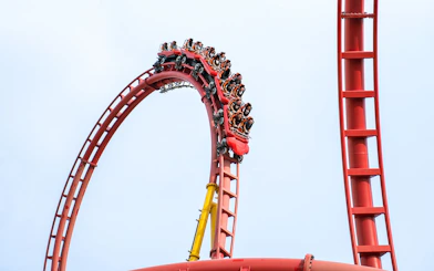 Rollercoaster loop at VinWonders with riders in motion.