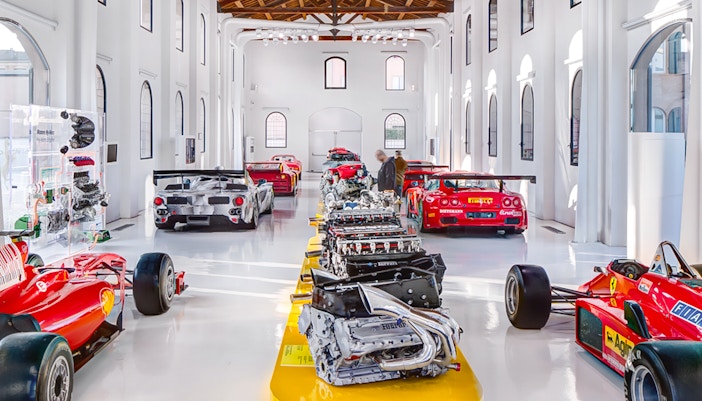 Ferrari cars and engines displayed at Ferrari Museum Modena and Maranello.