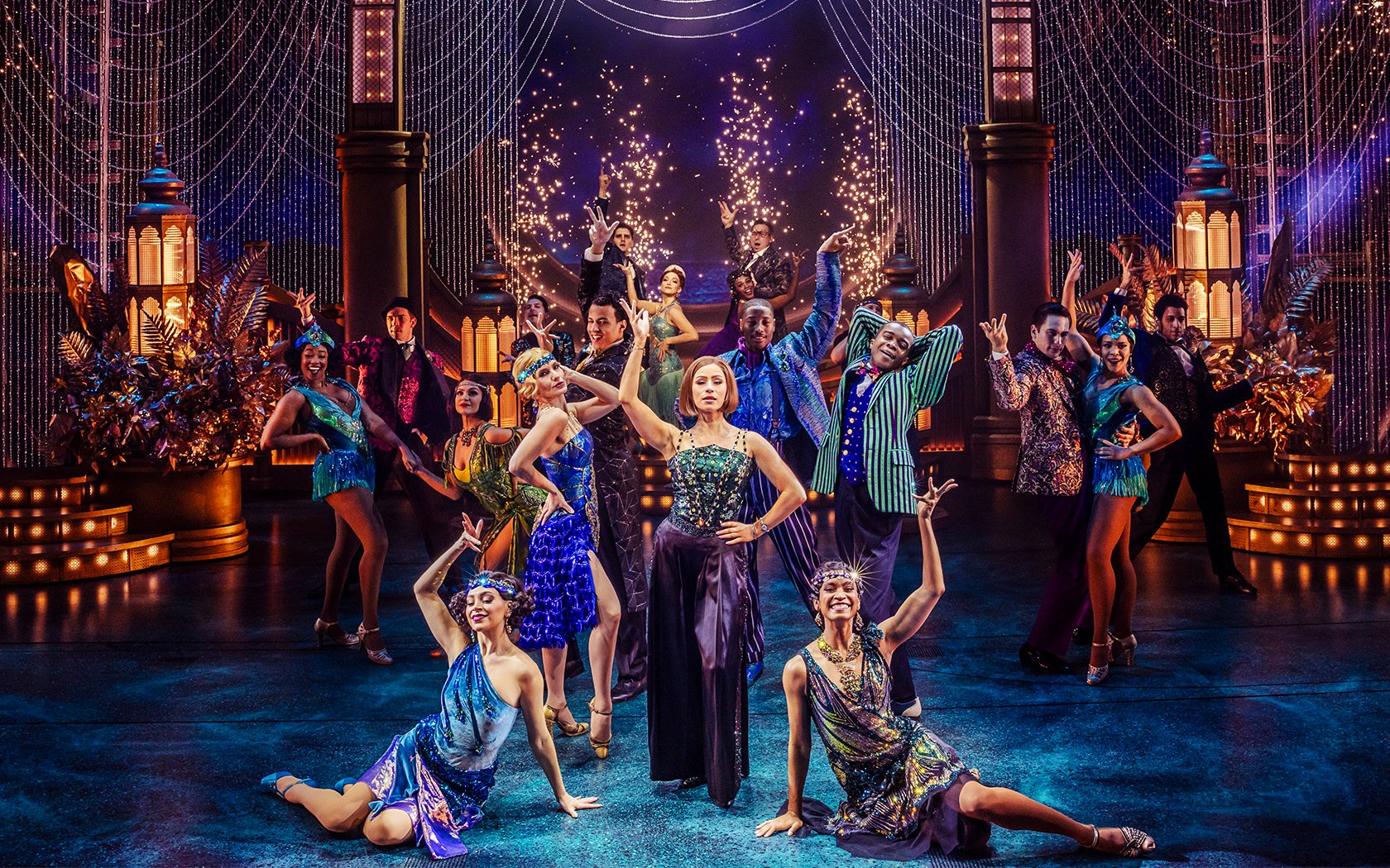 Stage performance of The Great Gatsby in New York with dancers in 1920s attire.
