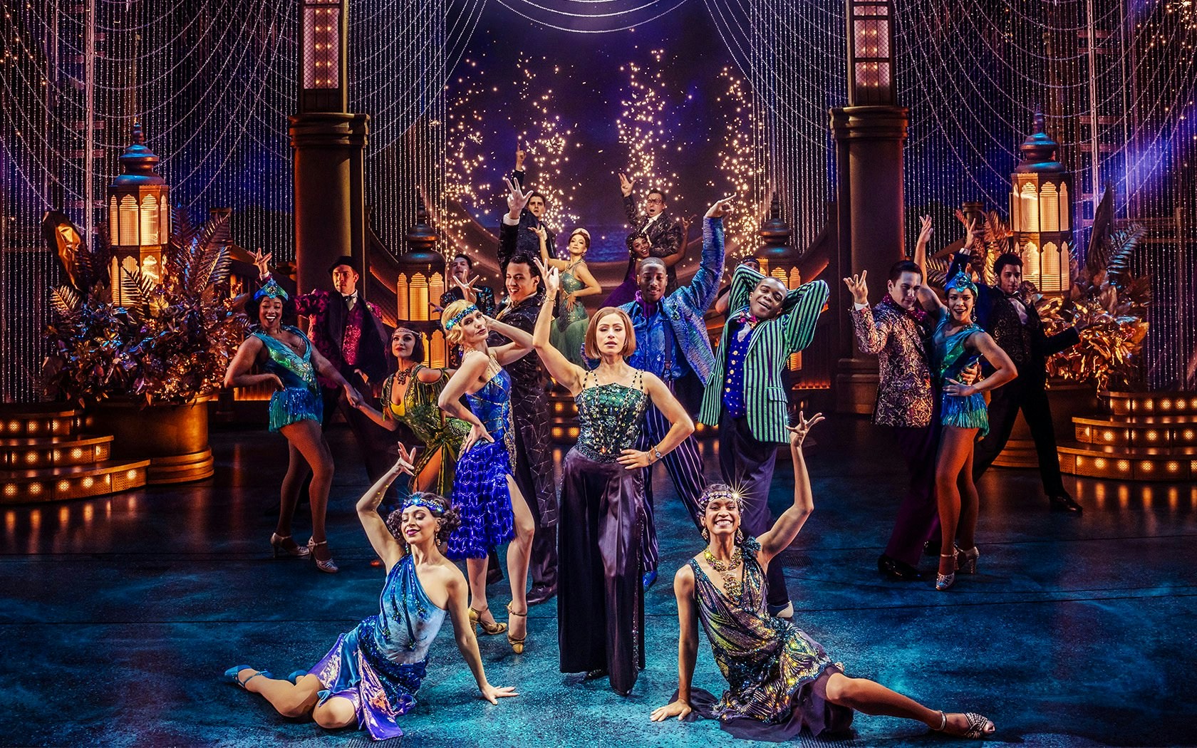 Stage performance of The Great Gatsby in New York with dancers in 1920s attire.
