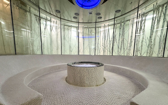 Circular sauna room with central stone feature at Aqua field, VinPearl Harbour, Nha Trang, Vietnam.