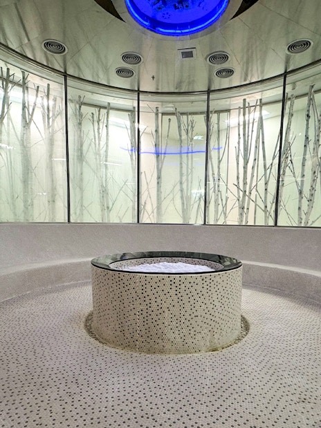 Circular sauna room with central stone feature at Aqua field, VinPearl Harbour, Nha Trang, Vietnam.