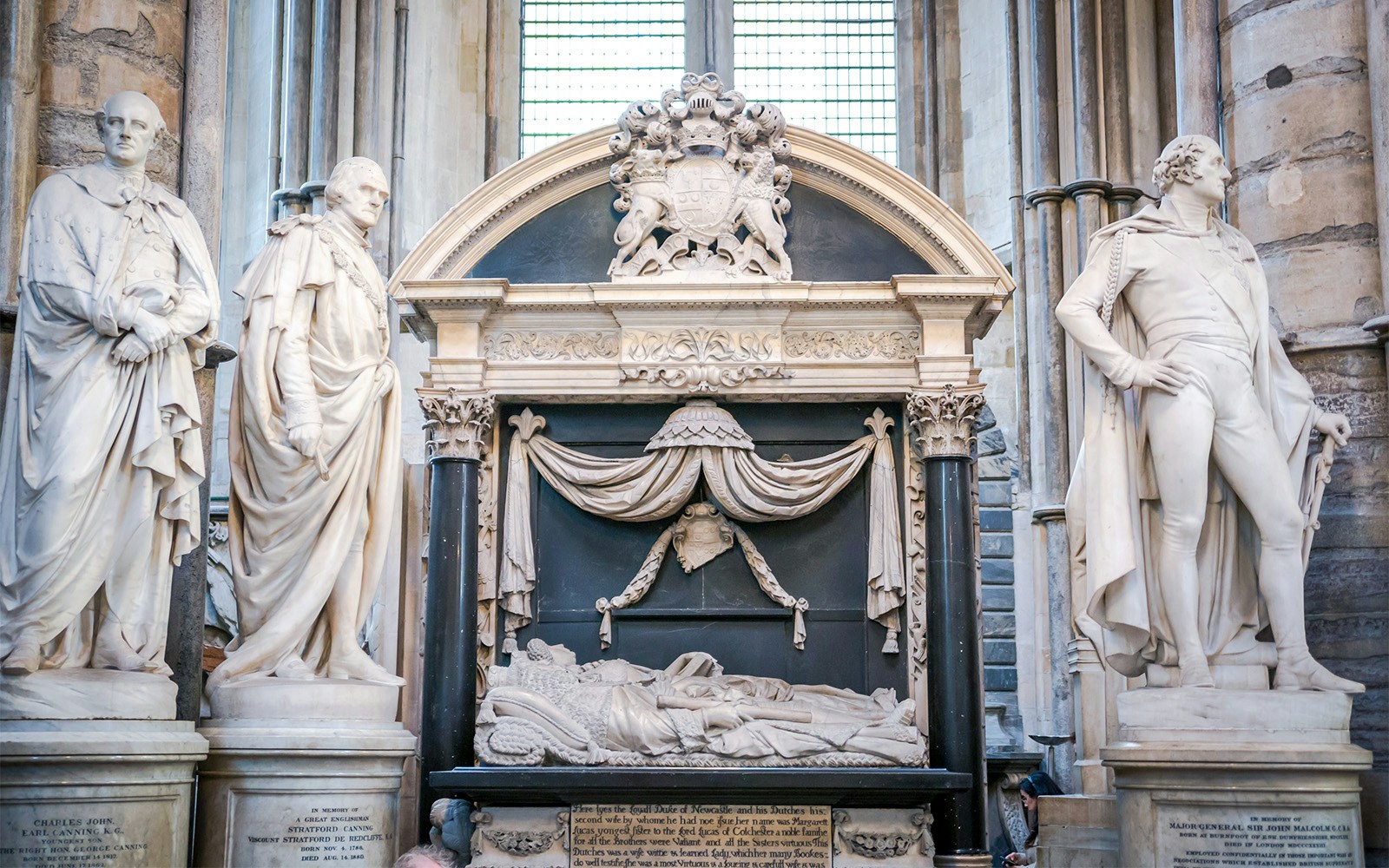 Sculptures and tomb in Poet's Corner, Westminster Abbey, London.