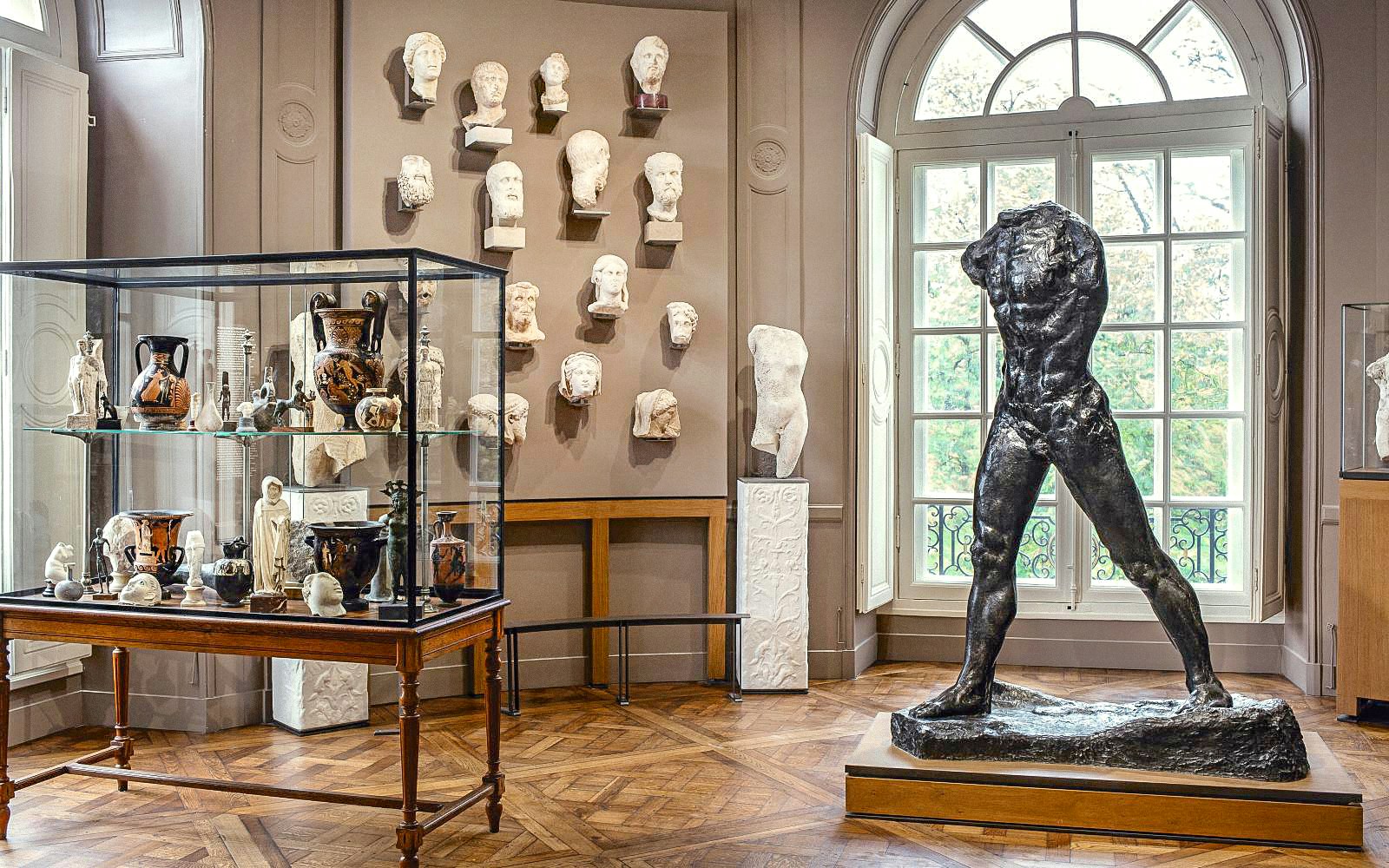 Rodin Museum interior with sculptures and artifacts display in Paris.