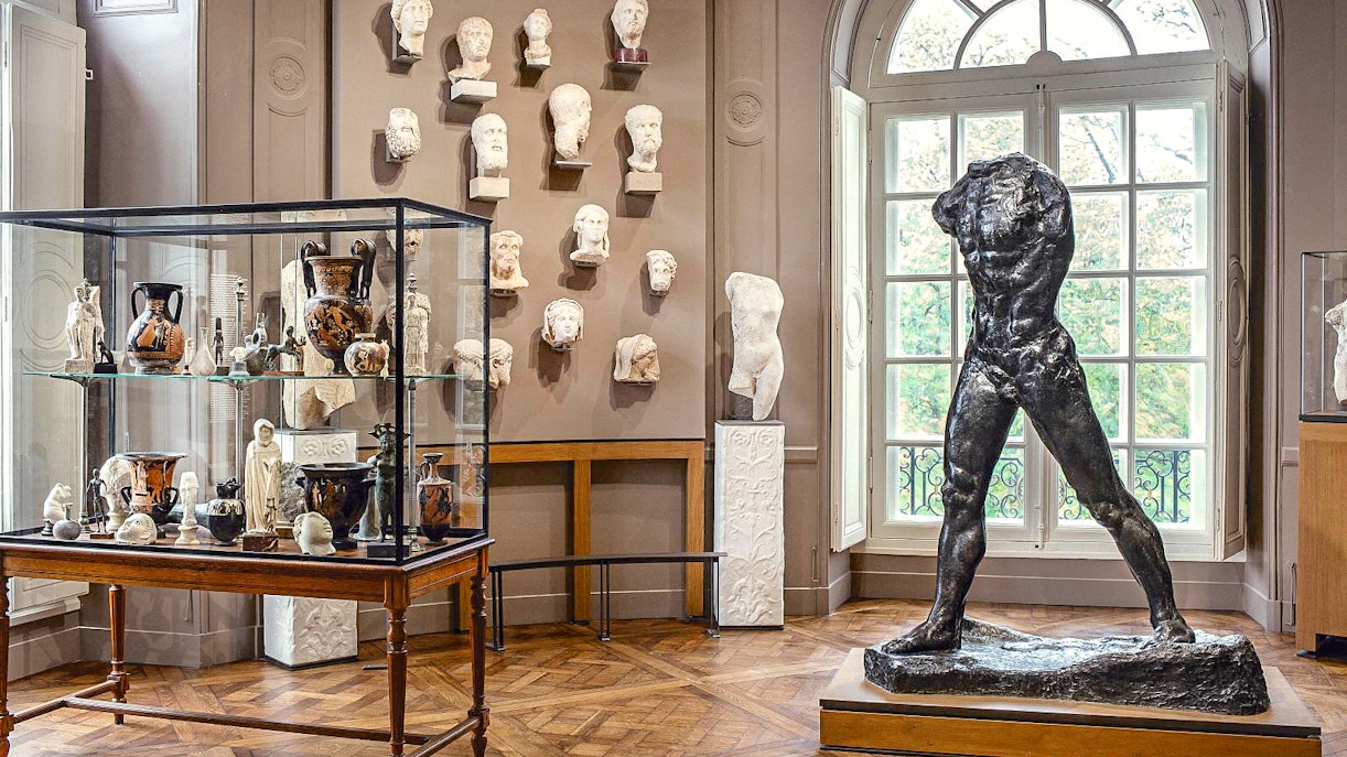 Rodin Museum interior with sculptures and artifacts display in Paris.