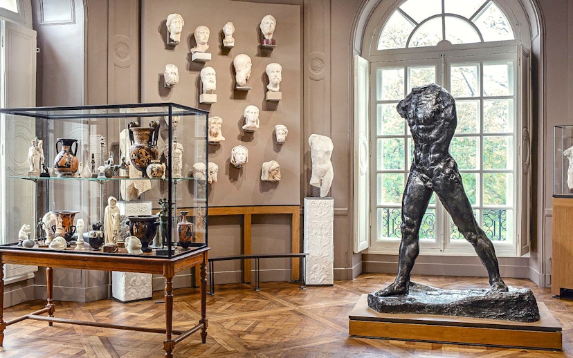 Rodin Museum interior with sculptures and artifacts display in Paris.