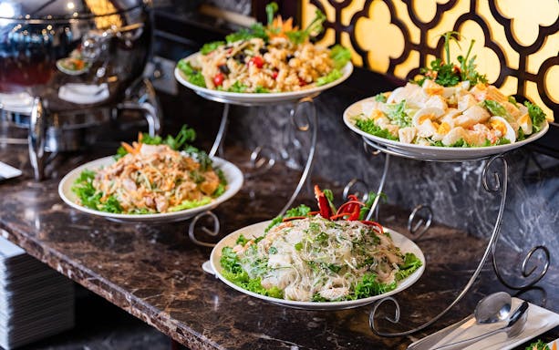 Buffet spread with salads and noodles on Amanda Luxury Cruise.