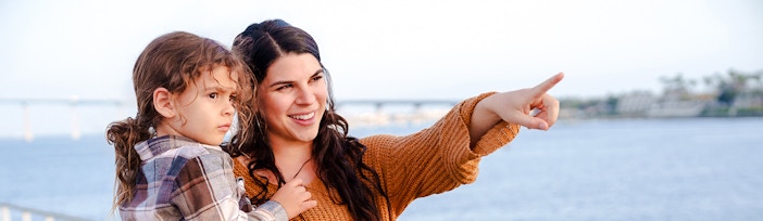 Mother and child enjoying the view on the Best of the Bay Harbor Tour, San Diego.
