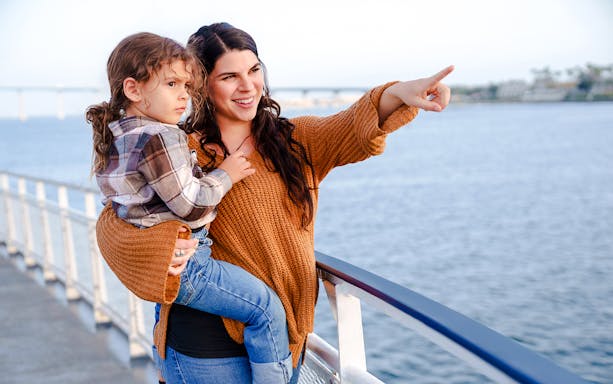 Mother and child enjoying the view on the Best of the Bay Harbor Tour, San Diego.