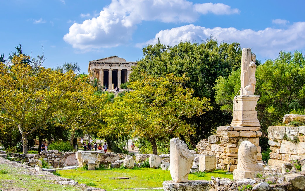 Ancient Agora of Athens with Temple of Hephaestus in the background, Greece.