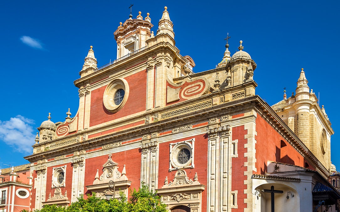 Salvador Church exterior with ornate facade in Seville, Spain.