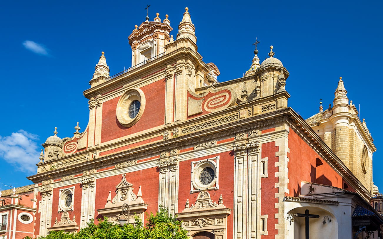 Salvador Church exterior with ornate facade in Seville, Spain.