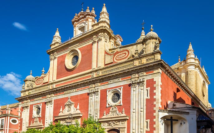Salvador Church exterior with ornate facade in Seville, Spain.