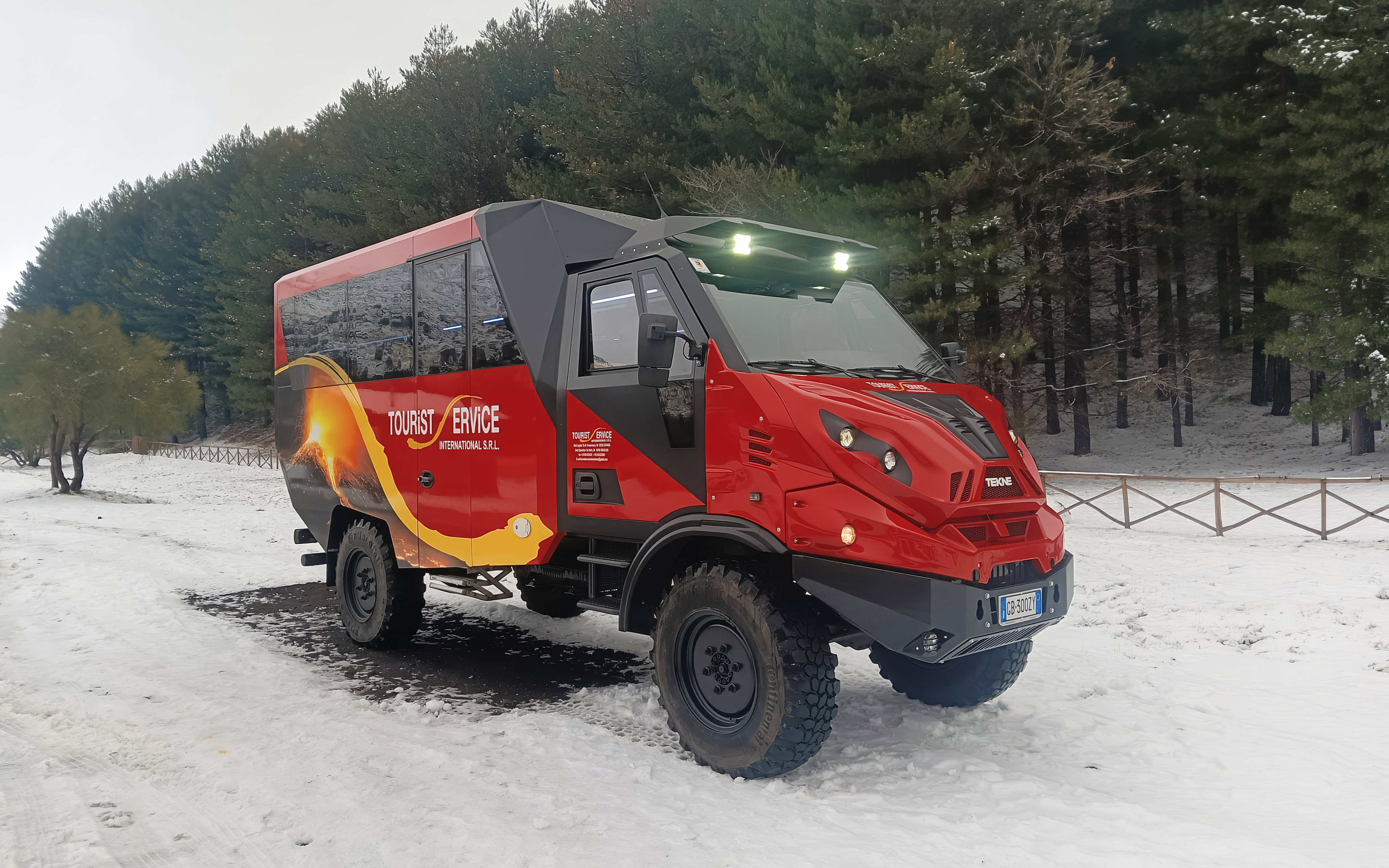 4x4 vehicle on snowy terrain during Mount Etna tour.
