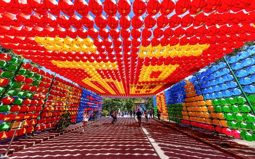 Colorful lantern tunnel in Tai O, Hong Kong, part of the 360 Tai O Pass experience.