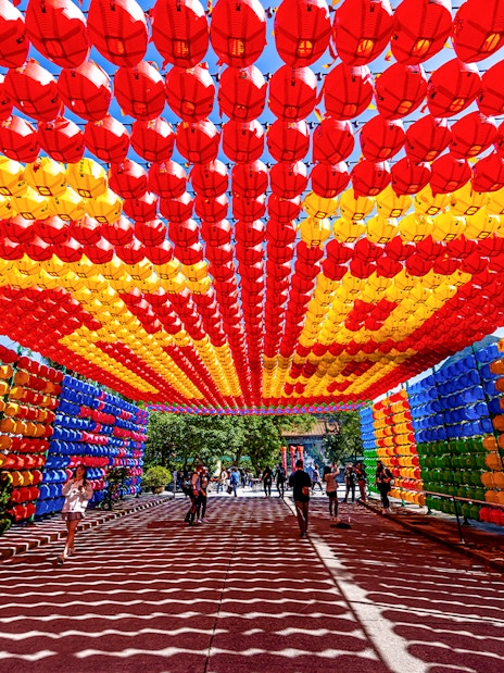 Colorful lantern tunnel in Tai O, Hong Kong, part of the 360 Tai O Pass experience.